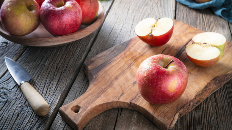 Fuji apples on cutting board