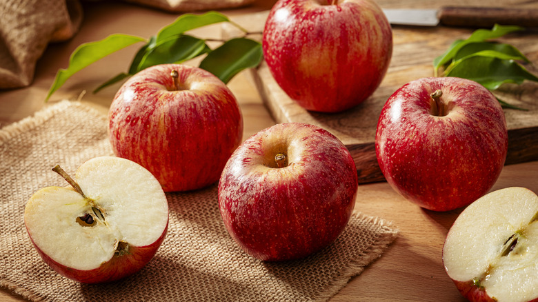 Gala apples on wooden table