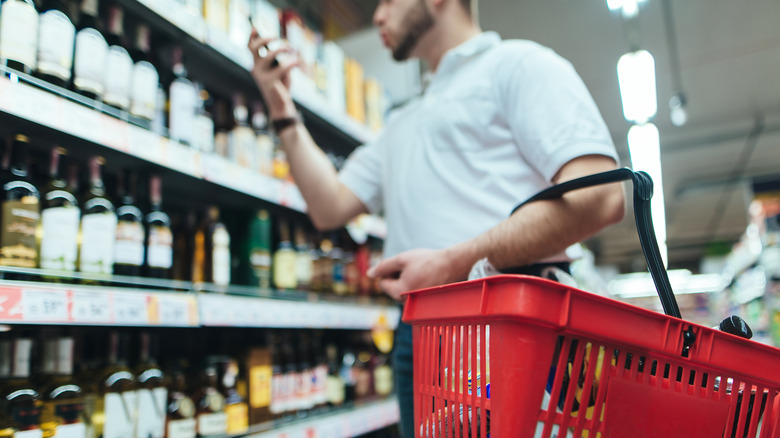 dude browsing liquor store