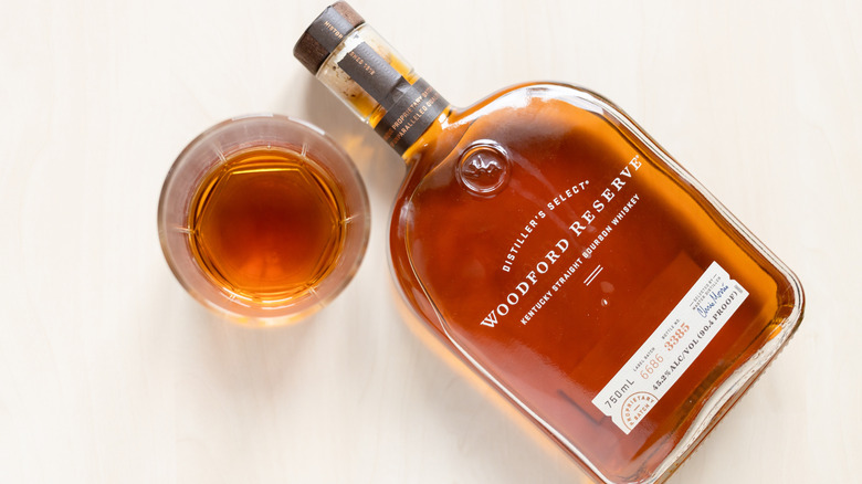 Bottle of Woodford Reserve with glass