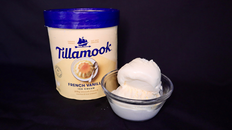 ice cream in bowl in front of yellow Tillamook container