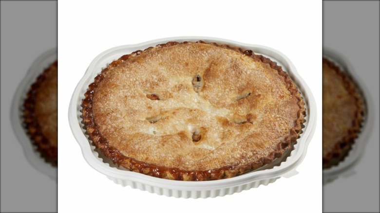 apple pie in white plastic dish