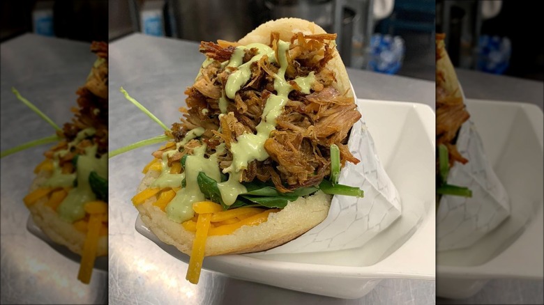 arepa with green sauce