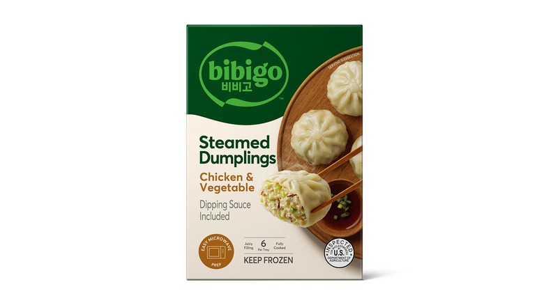 A box of Bibigo steamed dumplings on a white background