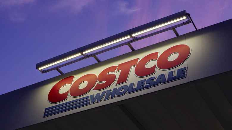 Picture of the Costco Wholesale sign at dusk