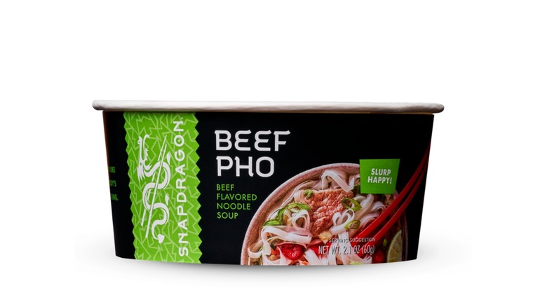 A bowl of Snapdragon microwavable pho on a white background