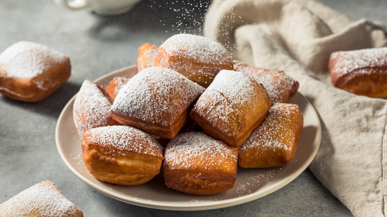 Beignets on white plate