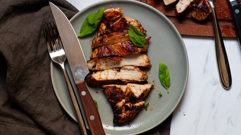 A plate filled with Blackened Chicken.