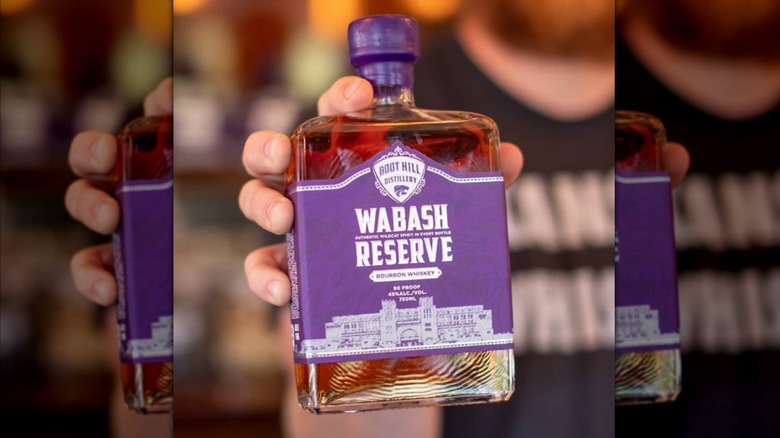 hand holding Wabash Reserve bourbon