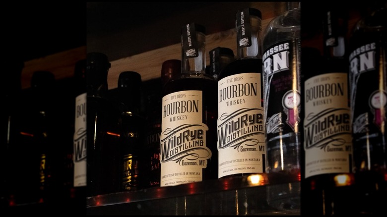 bottles of Wildrye Five Drops bourbon on a shelf