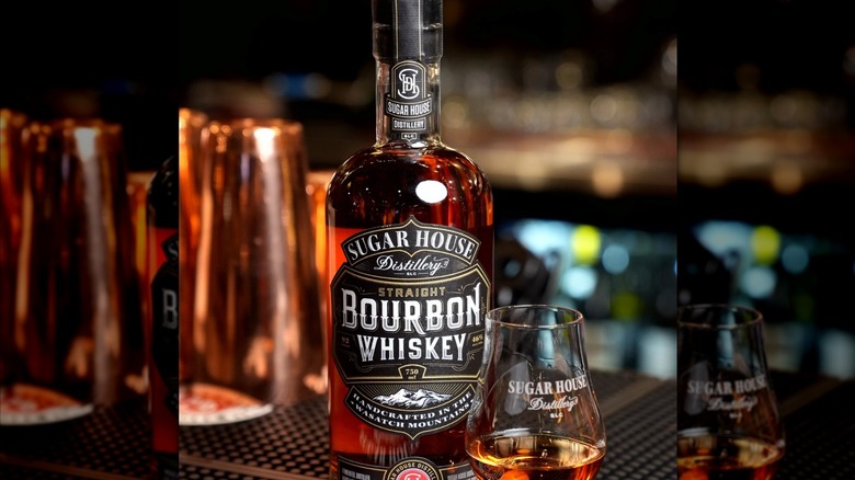 Sugar House bourbon bottle with snifter