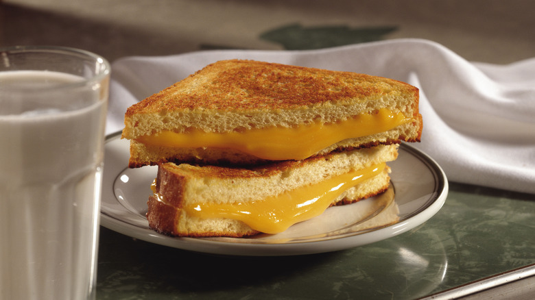 Grilled cheese and milk glass