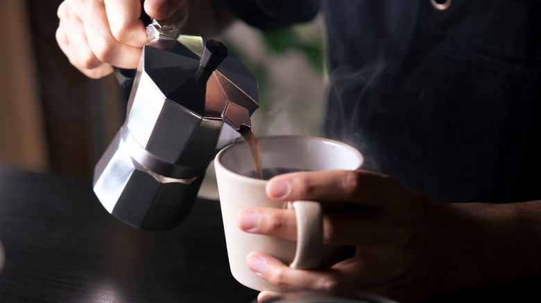 Man pouring coffee
