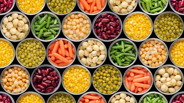 Open cans of vegetables and beans