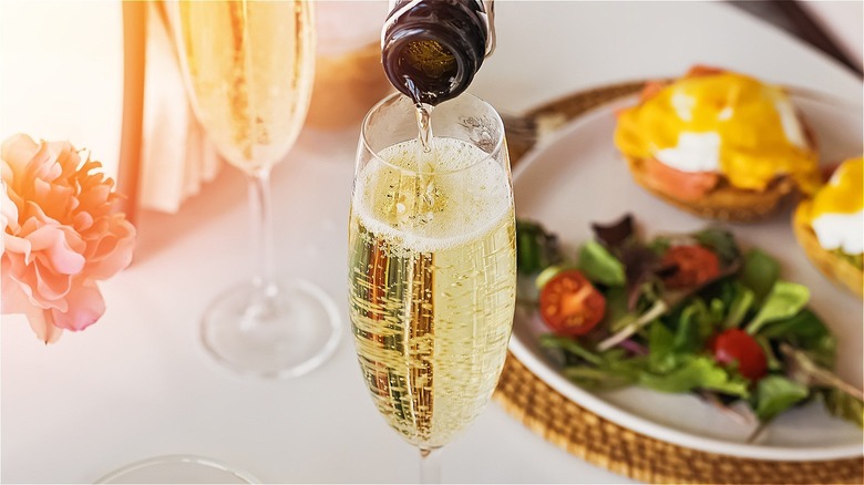 Champagne being poured into a glass