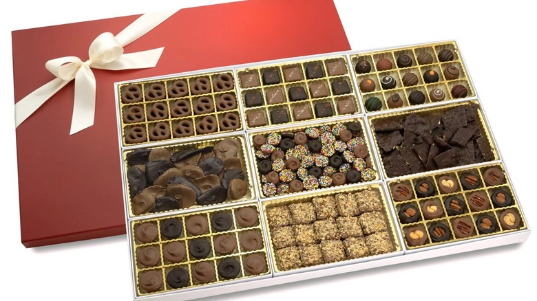 Large gift box of various chocolate candies.