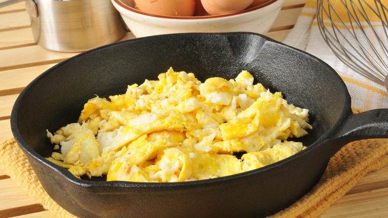 scrambled eggs in cast iron pan