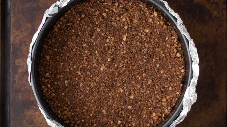 Cheesecake crust pressed into springform pan