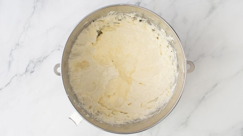 Whipped cream cheese in mixing bowl