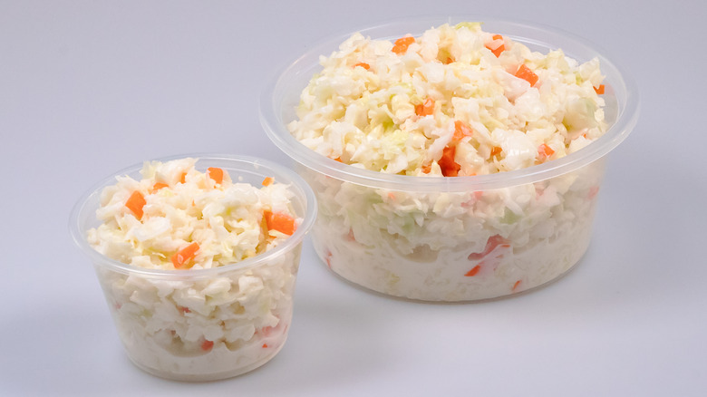 coleslaw in plastic bowls