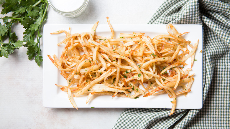 shoestring fries served on table