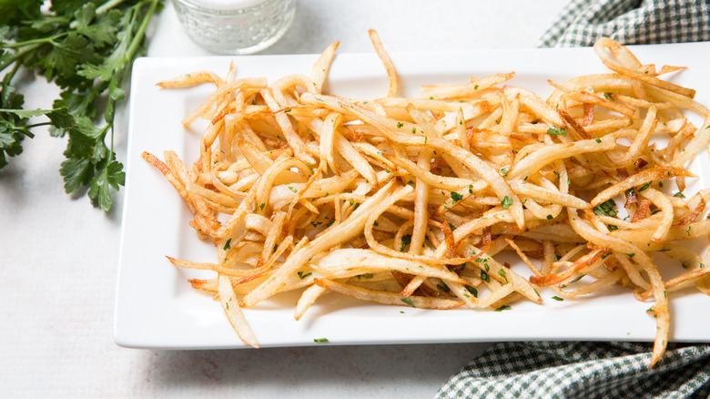 shoestring fries served on table
