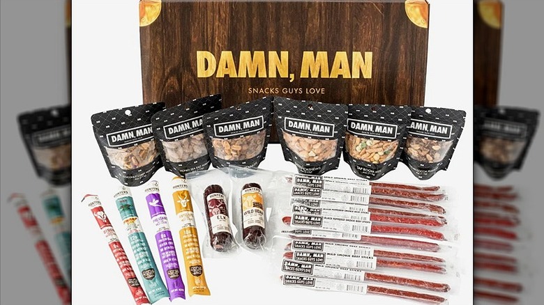 Damn, Man snack gift box with nuts, trail mix, and varieties of exotic meat jerky.