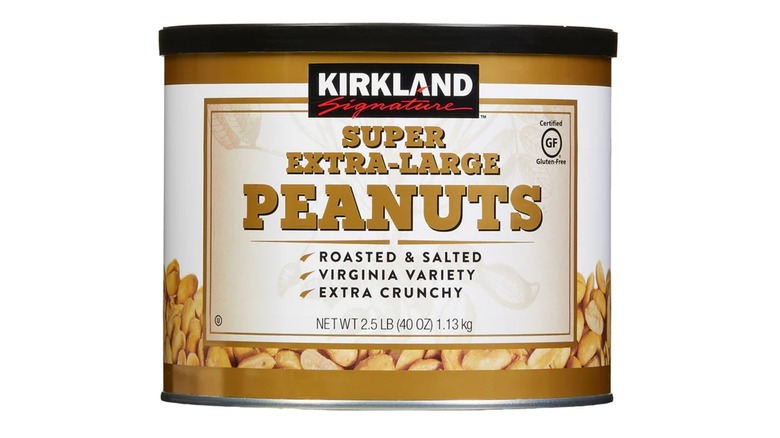 A container of Kirkland salted peanuts isolated on a white background