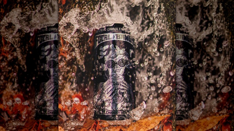 A can of Focal Banger from The Alchemist partially submerged as water splashes around it