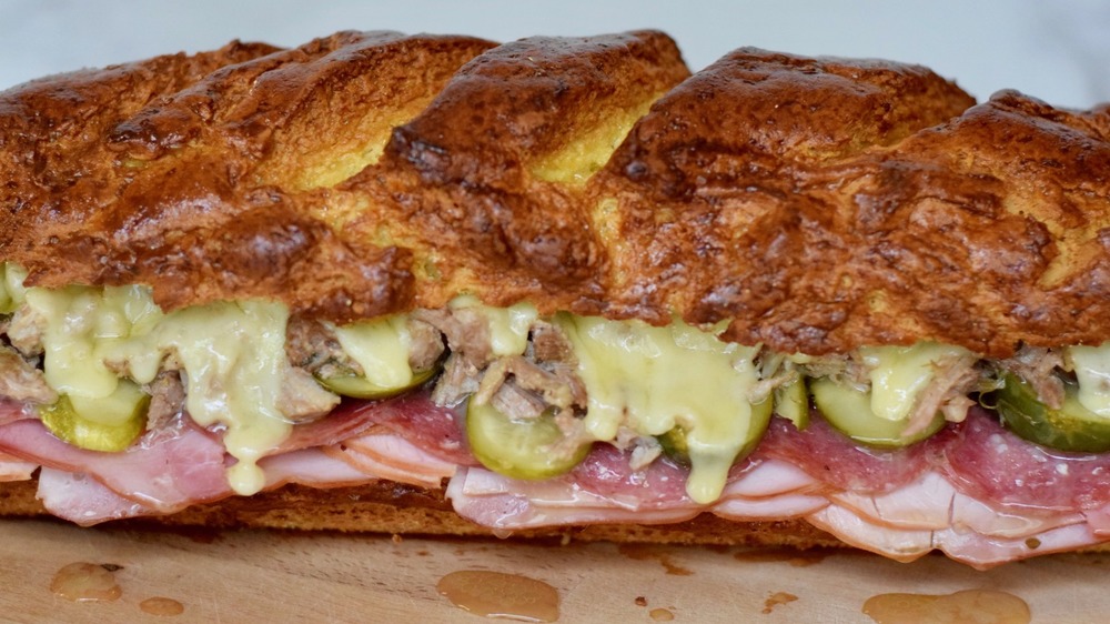 cuban sandwich with melting cheese pork and pickles