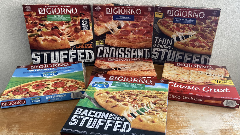 Seven DiGiorno pizza boxes