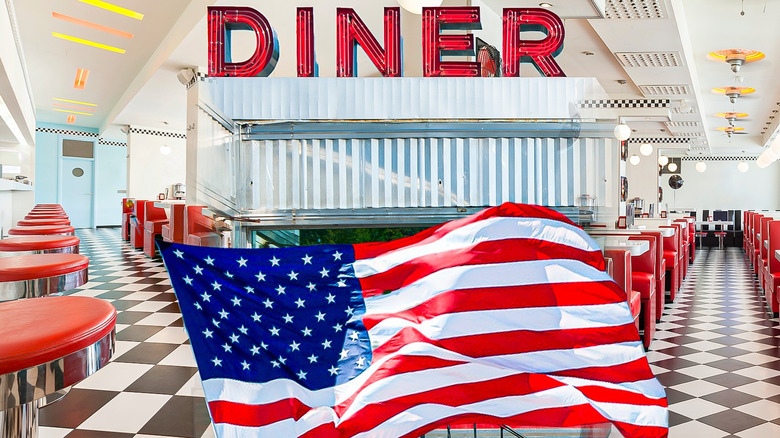 diner interior and sign composite image with american flag