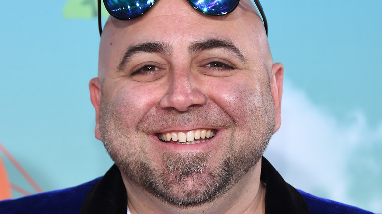 Duff Goldman smiles with sunglasses