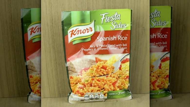 bag of seasoned rice against a wood backdrop