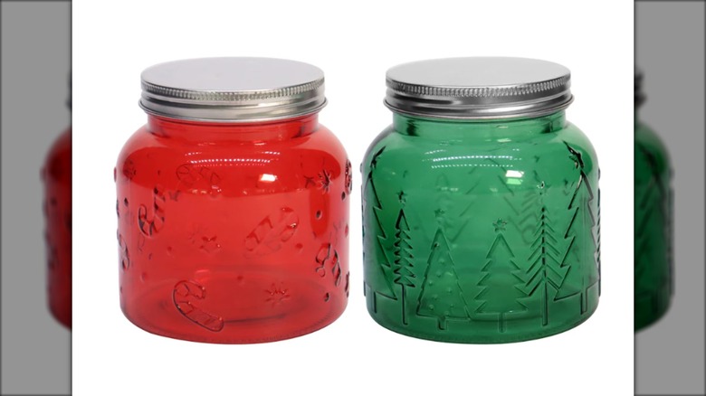two red and green jars with lids