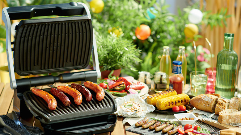 Sausages on an electric grill