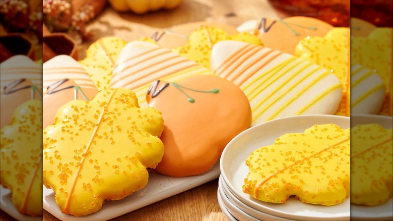 Fall cutout cookies on plate with fall decorations