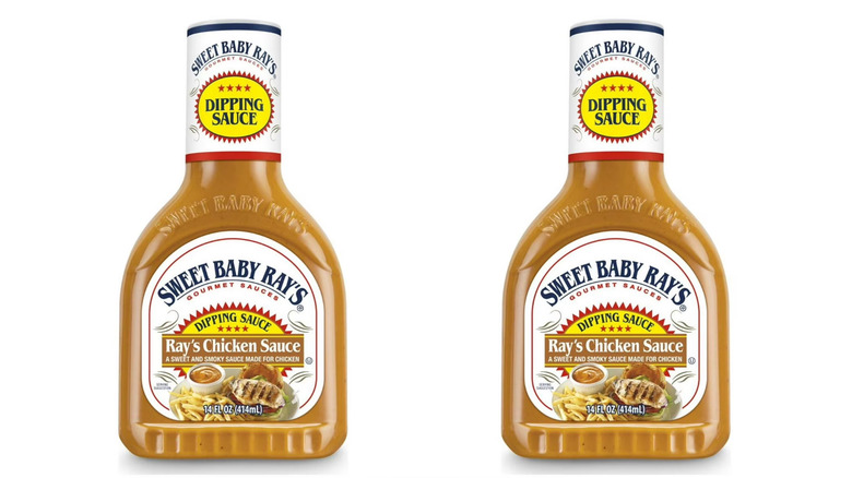 two bottles of Sweet Baby Ray's Chicken Sauce