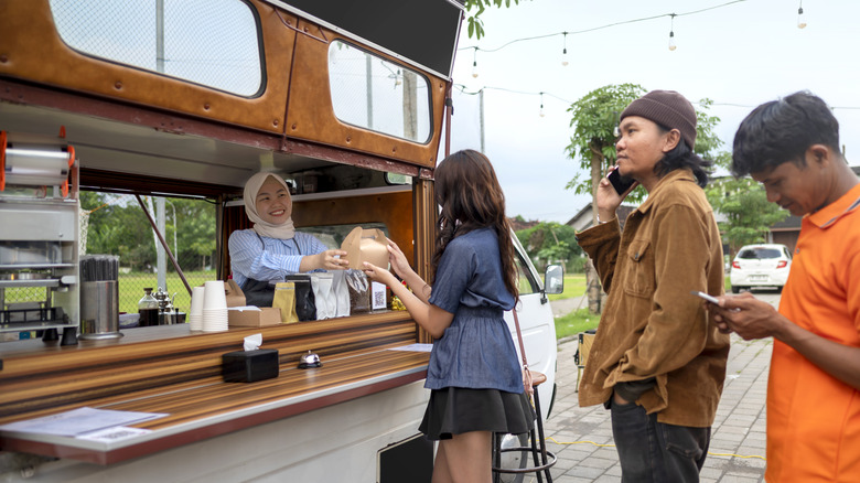 Customers at a food truck