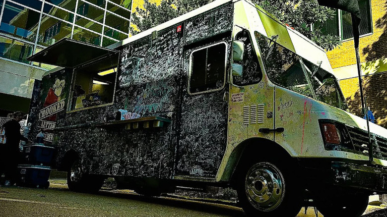 Crooked Letter Kitchen food truck, covered in signatures