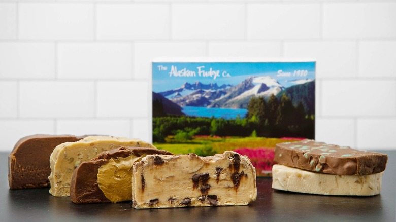 Assorted Fudge on a table with an Alaskan Fudge Co box in the background