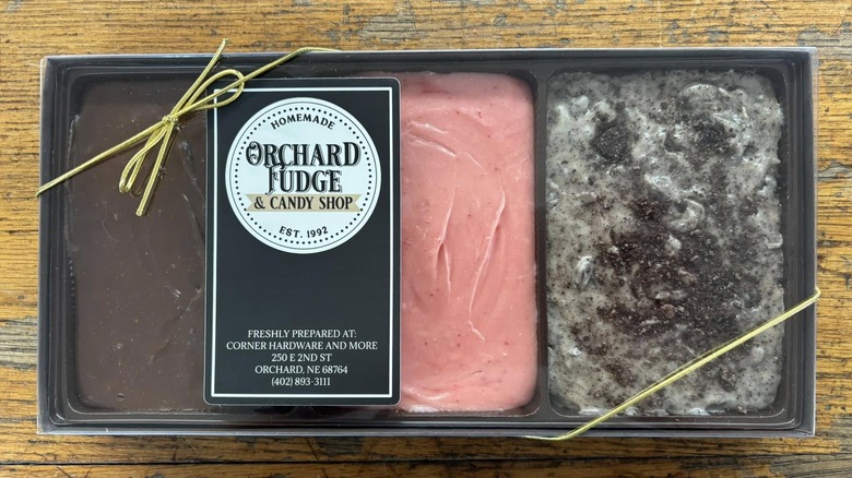 Assorted fudge on a tray with a stickers that reads "Orchard Fudge & Candy Shop"