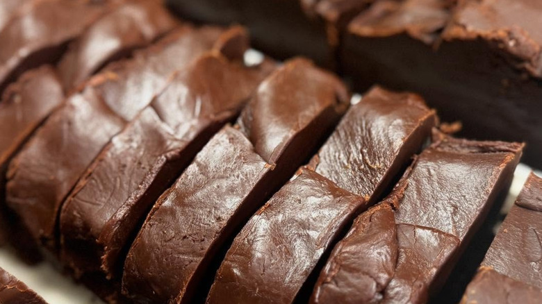 Sliced loaf of dark chocolate fudge on display at the fudge shoppe