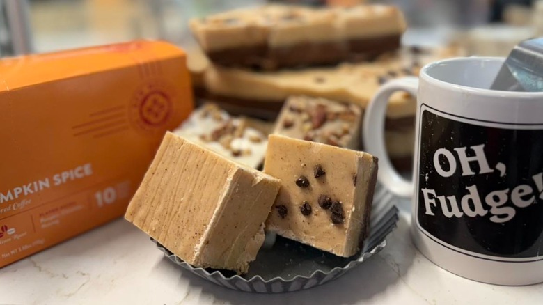 Pumpkin fudge next to mug on counter at Candy Mountain Fudge