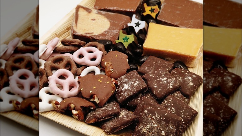 Assorted treats including fudge, bombons in the shape of the state of texas, and pretzels