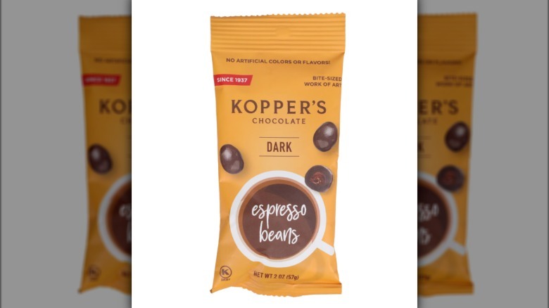 wooden bowl of chocolate-covered coffee beans