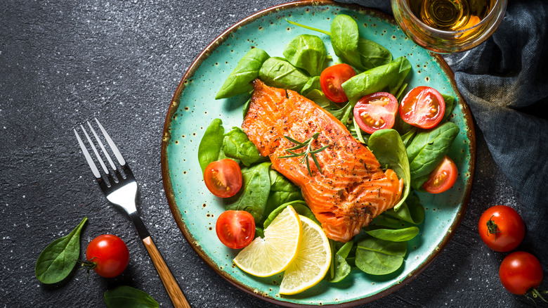 salmon over spinach salad