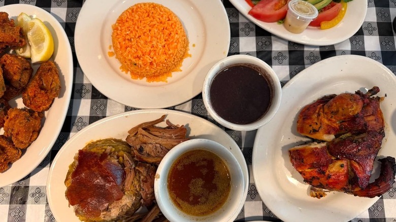 A table full of Puerto Rican dishes at Casa Adela in the East Village.