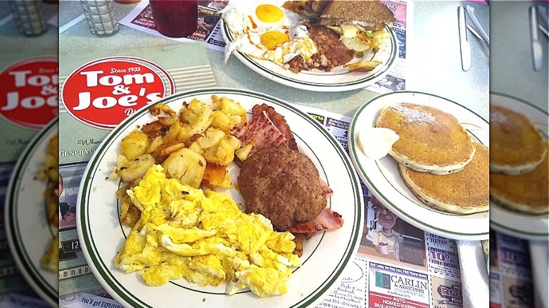 breakfast dishes on table at tom and joe's diner
