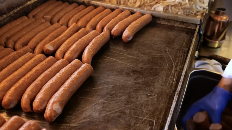 polish sausages on flat top grill